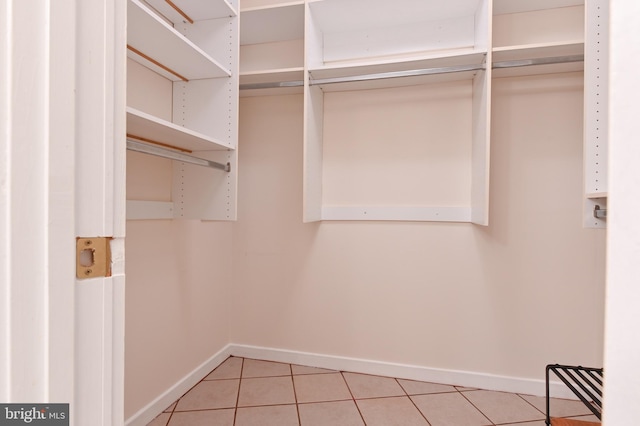 2012 Quay Village Ct Unit 202, Annapolis, MD 21403 - walk in closet with light tile patterned flooring