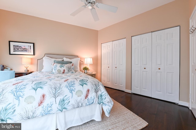 2012 Quay Village Ct Unit 202, Annapolis, MD 21403 - bedroom featuring two closets, dark wood-style floors, a ceiling fan, and baseboards