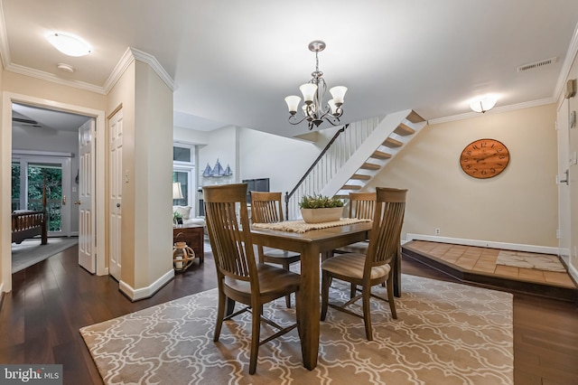 2012 Quay Village Ct Unit 202, Annapolis, MD 21403 - dining room with crown molding, wood finished floors, baseboards, a chandelier, and stairway