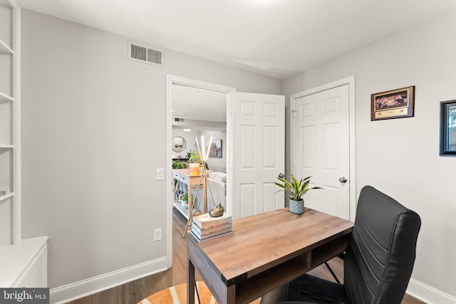 124 Fort Evans Rd SE Unit B, Leesburg, VA 20175 - office area with wood finished floors and baseboards
