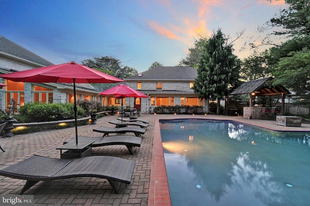 1716 Olmsted Way E, Camp Hill, PA 17011 - pool at dusk featuring a gazebo and a patio area