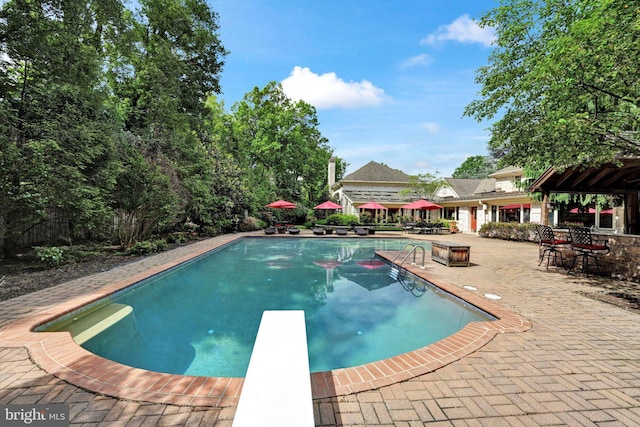 1716 Olmsted Way E, Camp Hill, PA 17011 - swimming pool with a diving board and a patio area