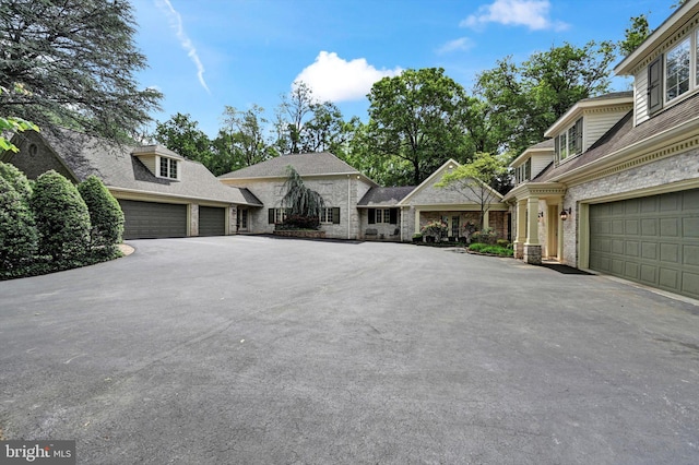 1716 Olmsted Way E, Camp Hill, PA 17011 - view of front of property with stone siding and a garage