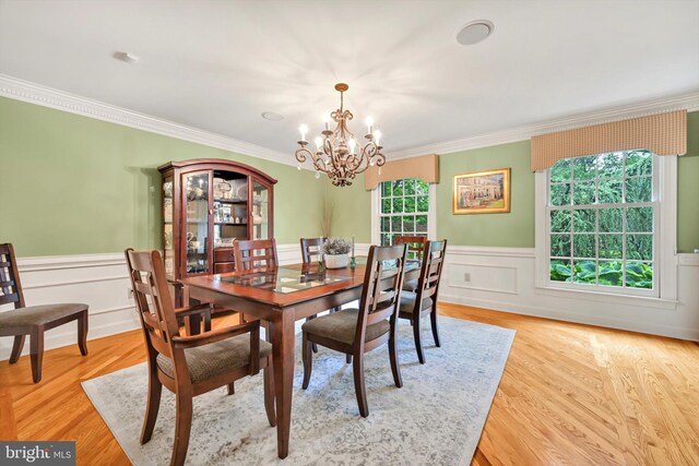 1716 Olmsted Way E, Camp Hill, PA 17011 - dining space featuring a chandelier, wainscoting, ornamental molding, and a decorative wall