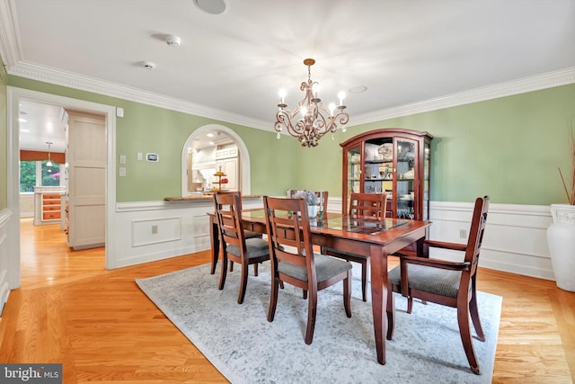 1716 Olmsted Way E, Camp Hill, PA 17011 - dining room with ornamental molding, a wainscoted wall, a chandelier, light wood-style floors, and a decorative wall