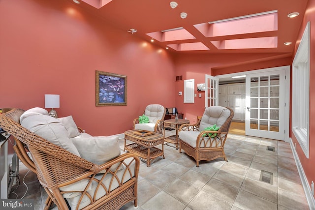 1716 Olmsted Way E, Camp Hill, PA 17011 - living area featuring french doors, a skylight, a high ceiling, and recessed lighting