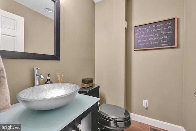 1716 Olmsted Way E, Camp Hill, PA 17011 - bathroom featuring vanity, toilet, and baseboards