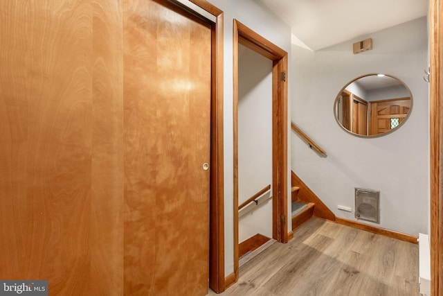 1051 Taylor St, State College, PA 16803 - hall featuring wood finished floors, stairs, and baseboards