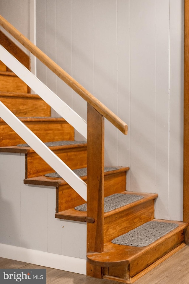 1051 Taylor St, State College, PA 16803 - stairway featuring wood finished floors and baseboards
