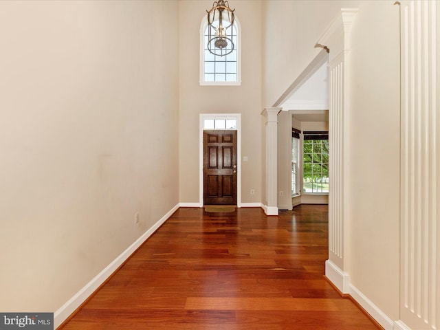 15 Wagon Shed Ln, Middletown, MD 21769 - foyer with plenty of natural light, wood finished floors, ornate columns, baseboards, and a towering ceiling