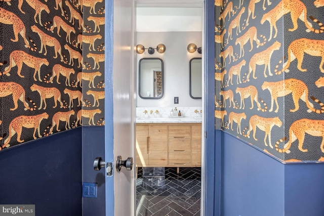 bathroom featuring double vanity