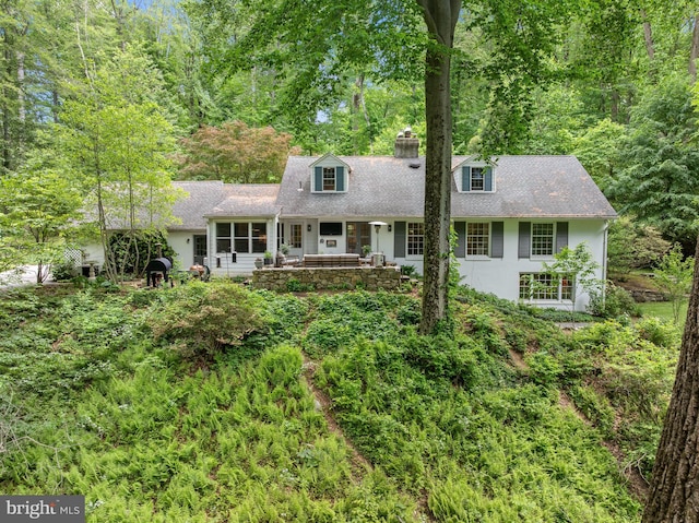 512 Worthington Rd, Chester Springs, PA 19425 - view of front of home featuring a chimney and stucco siding