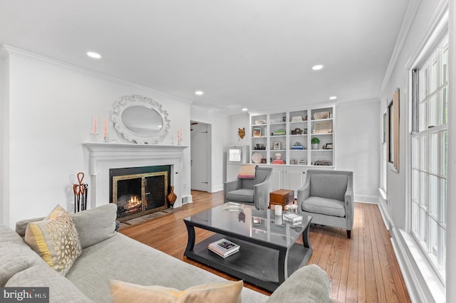512 Worthington Rd, Chester Springs, PA 19425 - living area featuring ornamental molding, hardwood / wood-style flooring, a fireplace with flush hearth, recessed lighting, and plenty of natural light