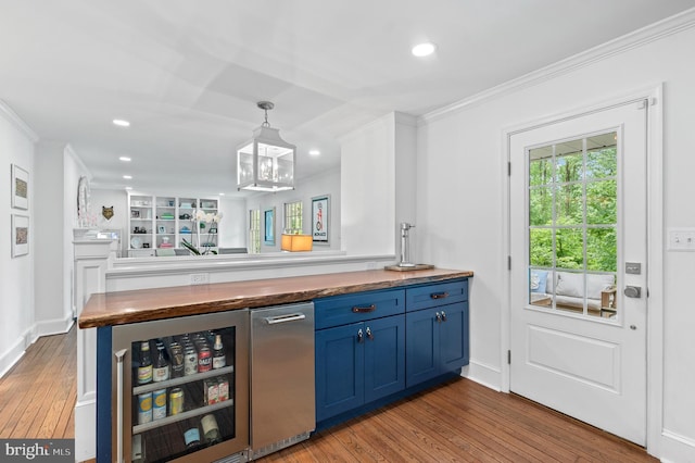 512 Worthington Rd, Chester Springs, PA 19425 - bar with beverage cooler, ornamental molding, hardwood / wood-style floors, recessed lighting, and baseboards