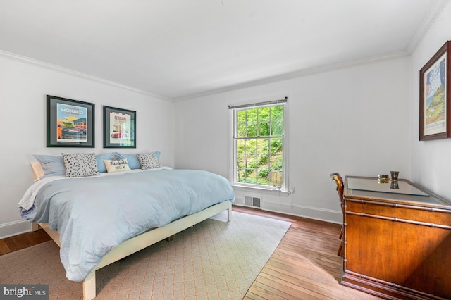 512 Worthington Rd, Chester Springs, PA 19425 - bedroom featuring crown molding, wood-type flooring, and baseboards