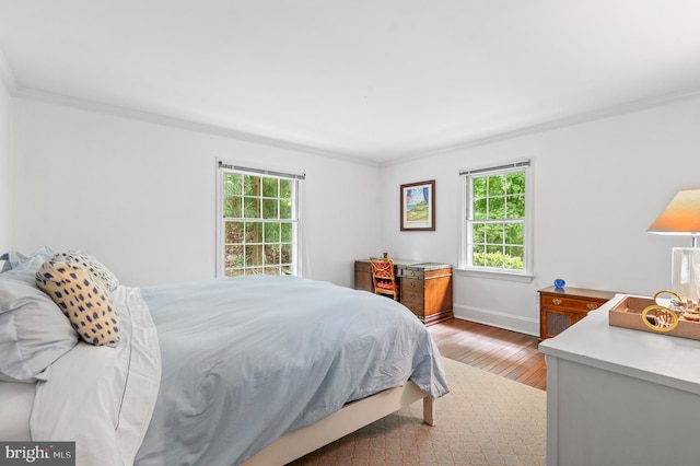 512 Worthington Rd, Chester Springs, PA 19425 - bedroom with ornamental molding, multiple windows, wood finished floors, and baseboards