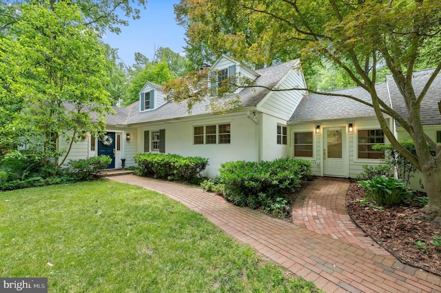 512 Worthington Rd, Chester Springs, PA 19425 - cape cod home with a front lawn, roof with shingles, and stucco siding