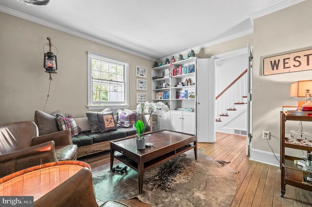 512 Worthington Rd, Chester Springs, PA 19425 - living area featuring stairs, wood-type flooring, ornamental molding, and baseboards