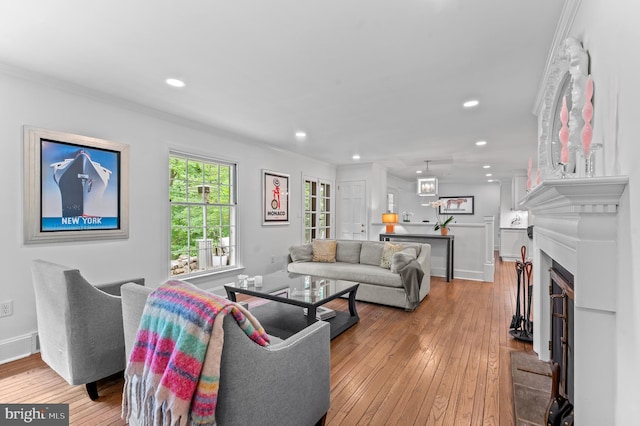512 Worthington Rd, Chester Springs, PA 19425 - living room featuring ornamental molding, recessed lighting, wood-type flooring, a fireplace, and baseboards