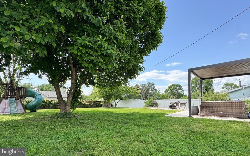 view of yard with a playground