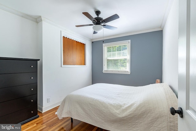 1128 Coventry Rd, Cheltenham, PA 19012 - bedroom with wood finished floors, crown molding, baseboards, and ceiling fan