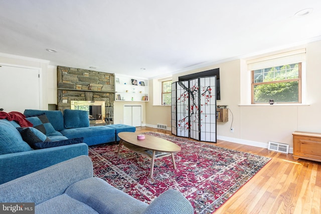 1128 Coventry Rd, Cheltenham, PA 19012 - living area with crown molding, baseboards, wood finished floors, a fireplace, and recessed lighting