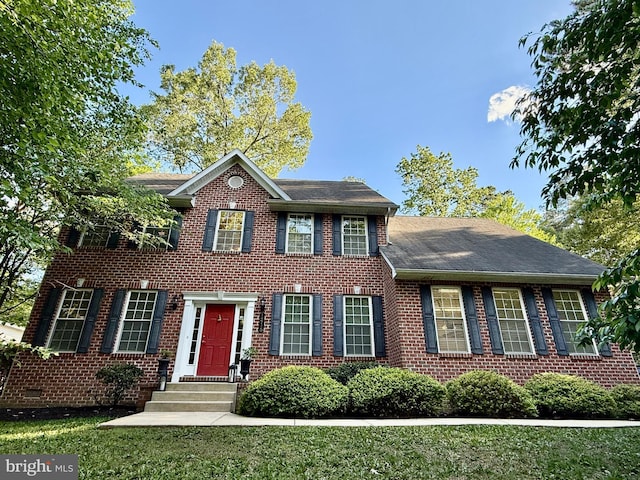 14745 Jennifer Ct, Issue, MD 20645 - view of front of property with brick siding, roof with shingles, and a front yard