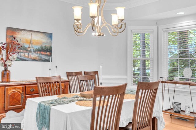 14745 Jennifer Ct, Issue, MD 20645 - dining area with a chandelier, wood finished floors, and ornamental molding