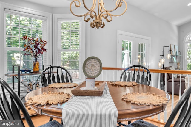 14745 Jennifer Ct, Issue, MD 20645 - dining room featuring a chandelier and wood finished floors