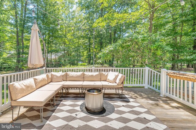 14745 Jennifer Ct, Issue, MD 20645 - wooden deck featuring an outdoor hangout area