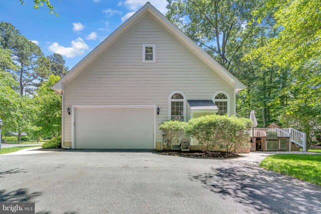 14745 Jennifer Ct, Issue, MD 20645 - view of property exterior with driveway and a deck