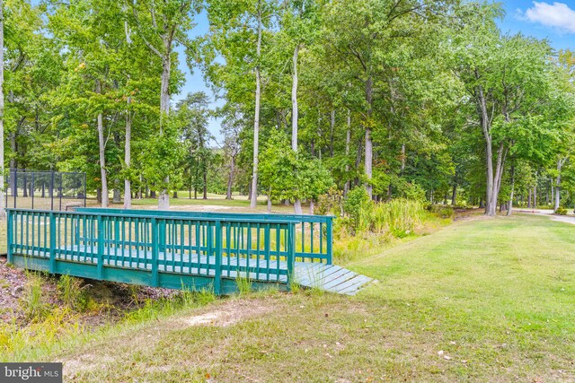 14745 Jennifer Ct, Issue, MD 20645 - view of swimming pool featuring a wooden deck and view of wooded area
