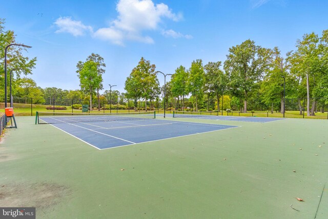 14745 Jennifer Ct, Issue, MD 20645 - view of tennis court with view of scattered trees and community basketball court