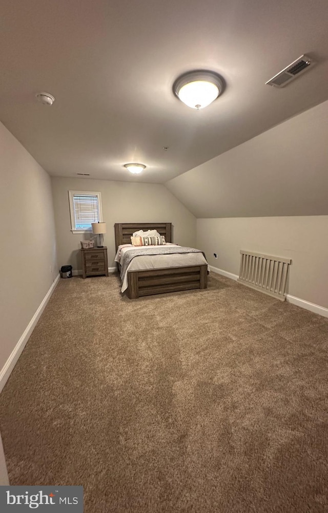 14745 Jennifer Ct, Issue, MD 20645 - carpeted bedroom featuring baseboards and vaulted ceiling
