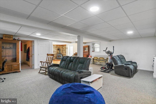 6194 Milo School Rd, Great Cacapon, WV 25422 - living room with a wood stove, carpet flooring, a drop ceiling, baseboards, and recessed lighting
