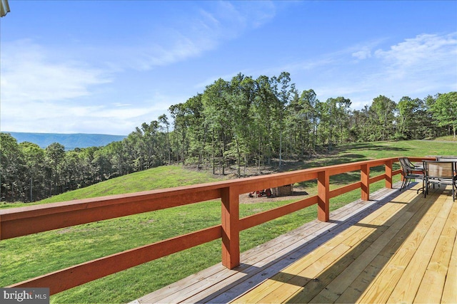 6194 Milo School Rd, Great Cacapon, WV 25422 - wooden deck featuring a lawn and outdoor dining space