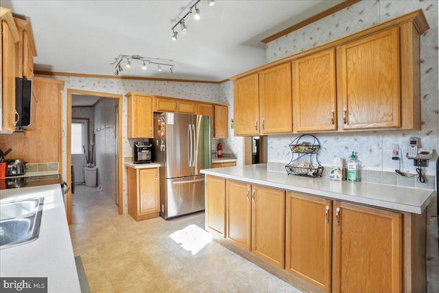 6194 Milo School Rd, Great Cacapon, WV 25422 - kitchen with wallpapered walls, freestanding refrigerator, light countertops, light floors, and ornamental molding