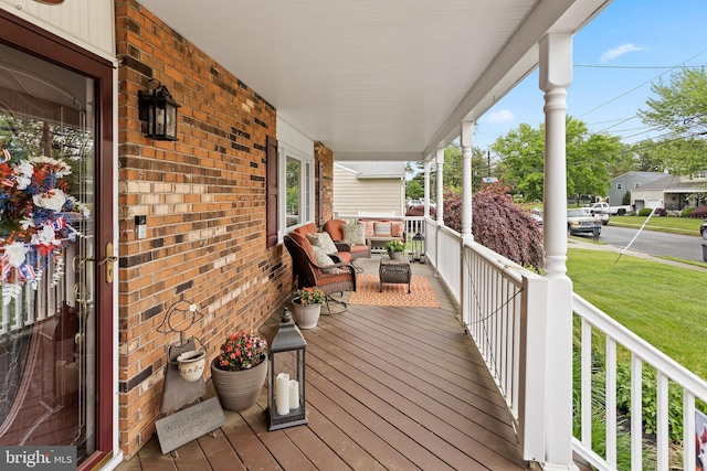 681 Shady Ln, Hamilton, NJ 08619 - wooden deck featuring covered porch and a lawn