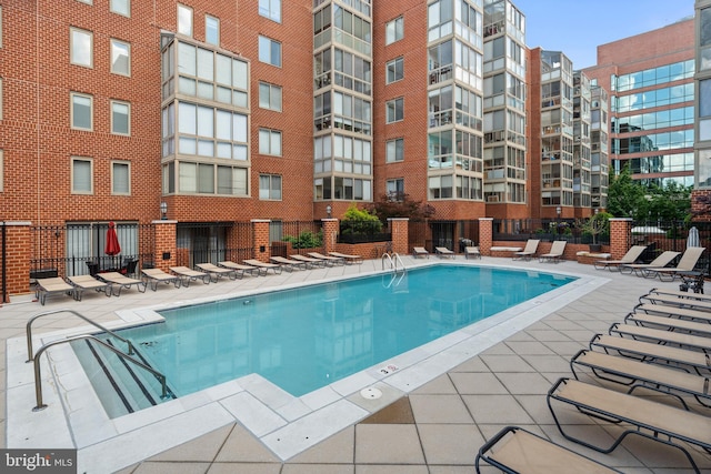 1045 N Utah St Unit 2-304, Arlington, VA 22201 - community pool featuring fence and a patio
