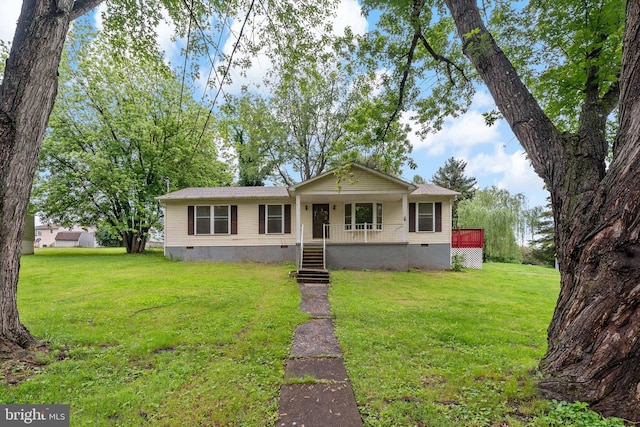 view of front of house with crawl space, a porch, and a front lawn