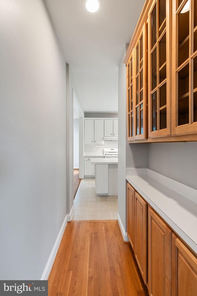600 Grace St, Herndon, VA 20170 - hall with light wood-type flooring and baseboards