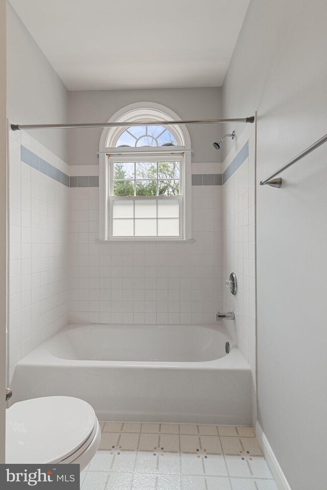 600 Grace St, Herndon, VA 20170 - bathroom with toilet, bathing tub / shower combination, and tile patterned floors