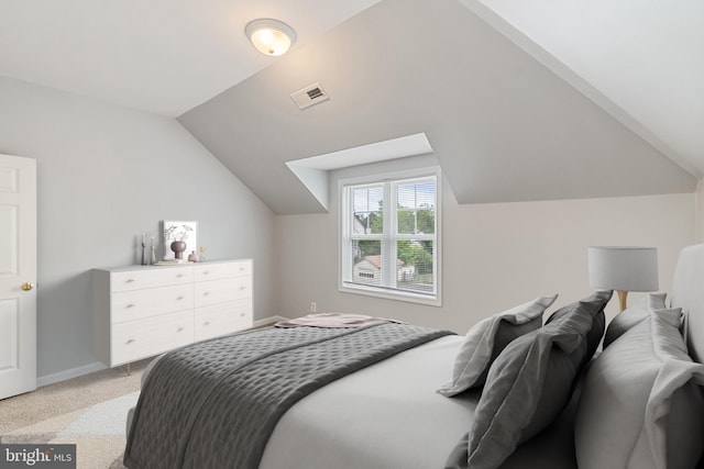 600 Grace St, Herndon, VA 20170 - bedroom featuring vaulted ceiling, light carpet, and baseboards