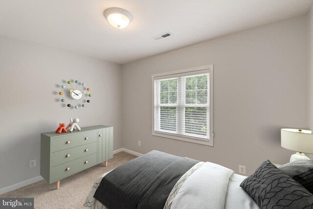 600 Grace St, Herndon, VA 20170 - bedroom with light carpet and baseboards