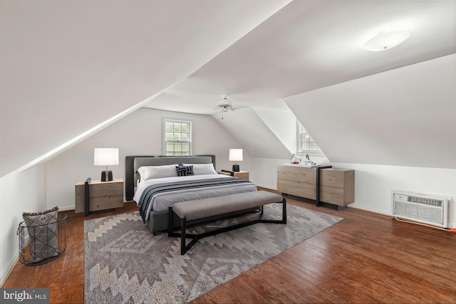 600 Grace St, Herndon, VA 20170 - bedroom featuring wood finished floors, lofted ceiling, baseboards, heating unit, and a ceiling fan