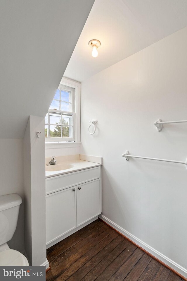 600 Grace St, Herndon, VA 20170 - bathroom featuring wood finished floors, toilet, and vanity