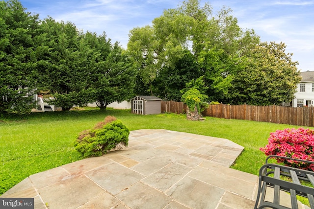 600 Grace St, Herndon, VA 20170 - view of patio / terrace featuring a storage shed and an outbuilding