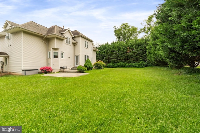 600 Grace St, Herndon, VA 20170 - view of grassy yard with a patio area