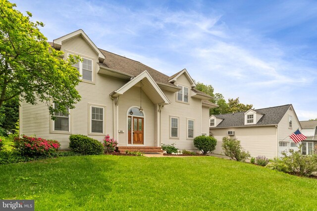 600 Grace St, Herndon, VA 20170 - traditional home featuring a front yard and a shingled roof