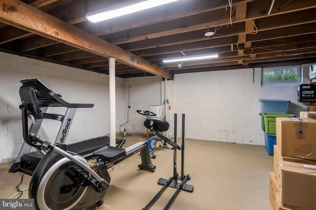 exercise area with concrete block wall